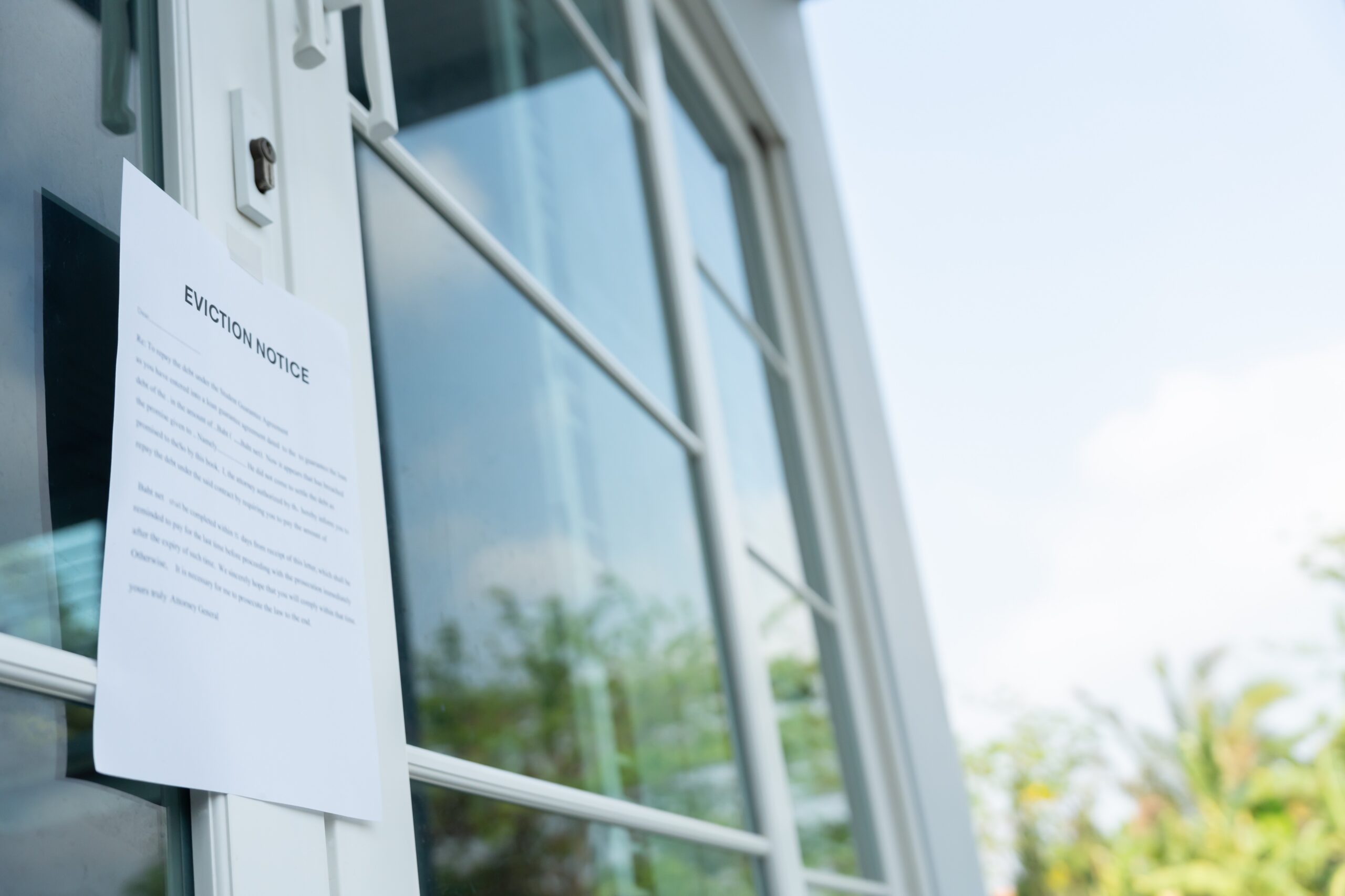 Notice of commercial eviction posted on a window